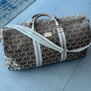 Michael Kors, gold and white duffel bag